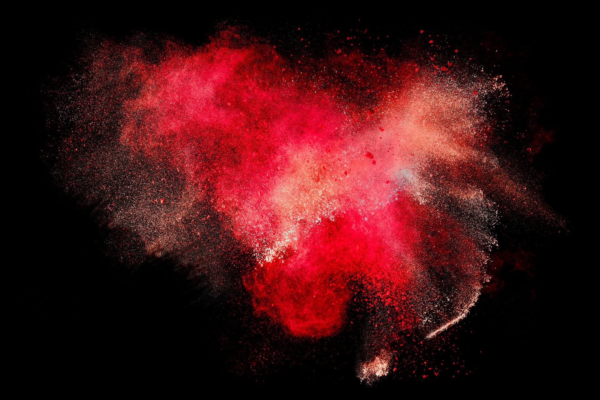 The image is a depiction of a red and black explosion, resembling fireworks or a nebula.